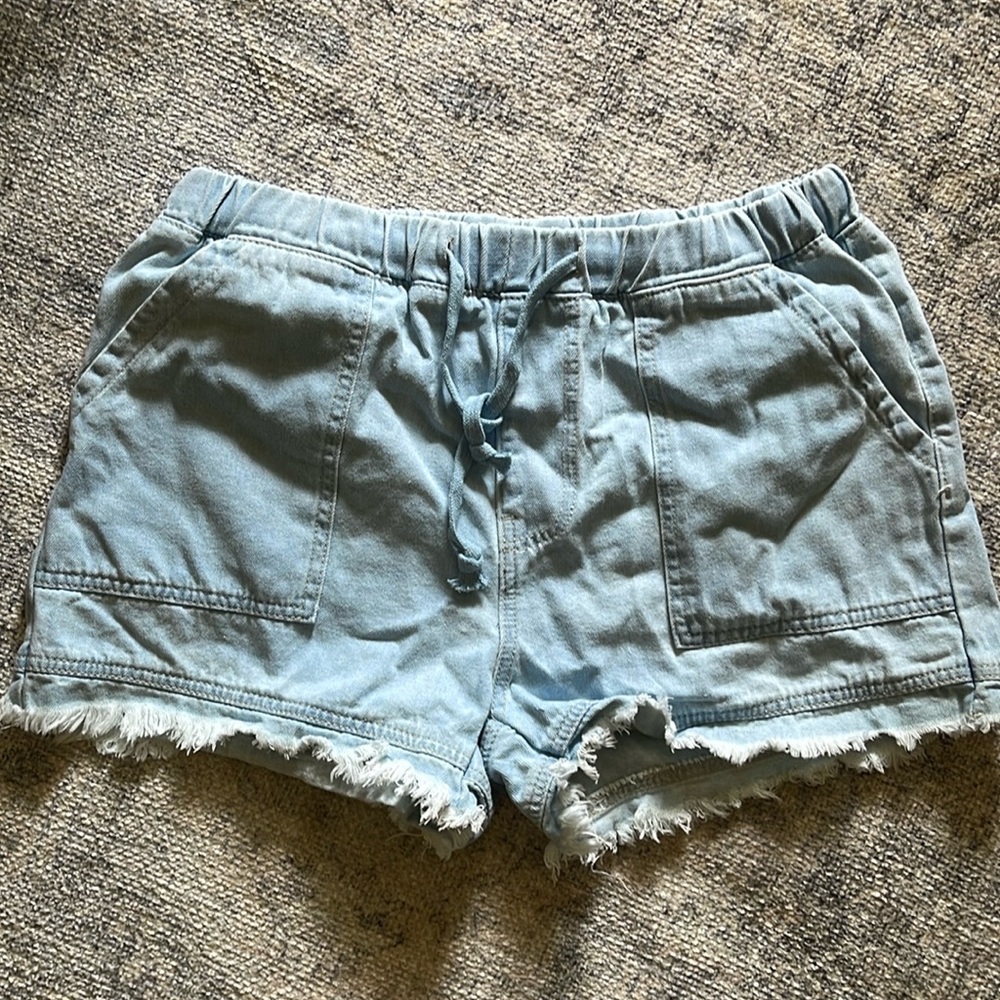 Women's pull on denim shorts with frayed legs